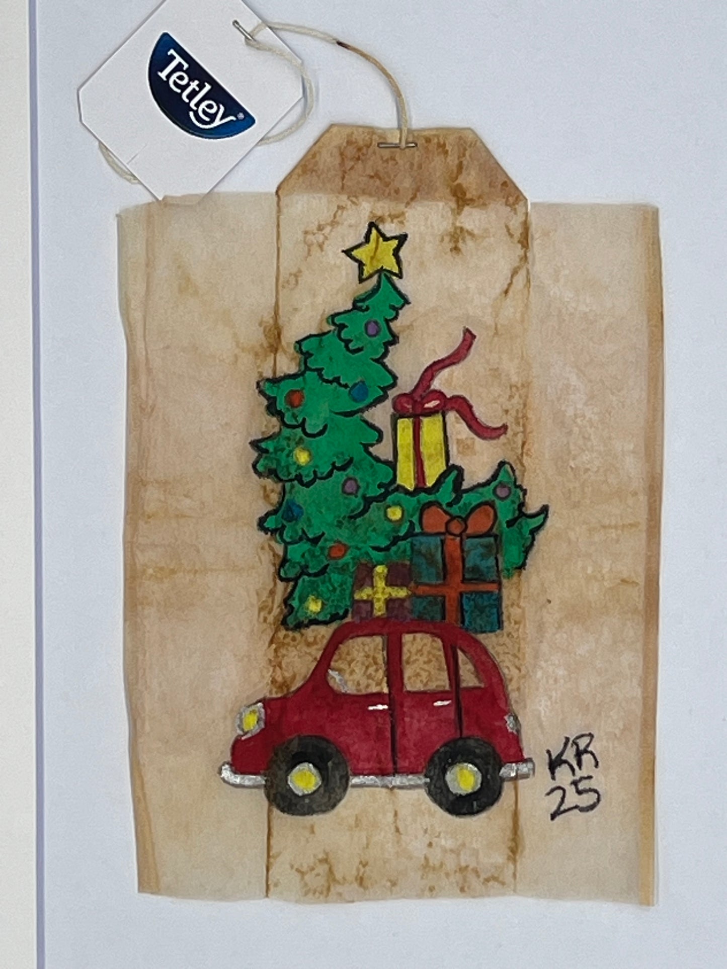 Car with presents and tree