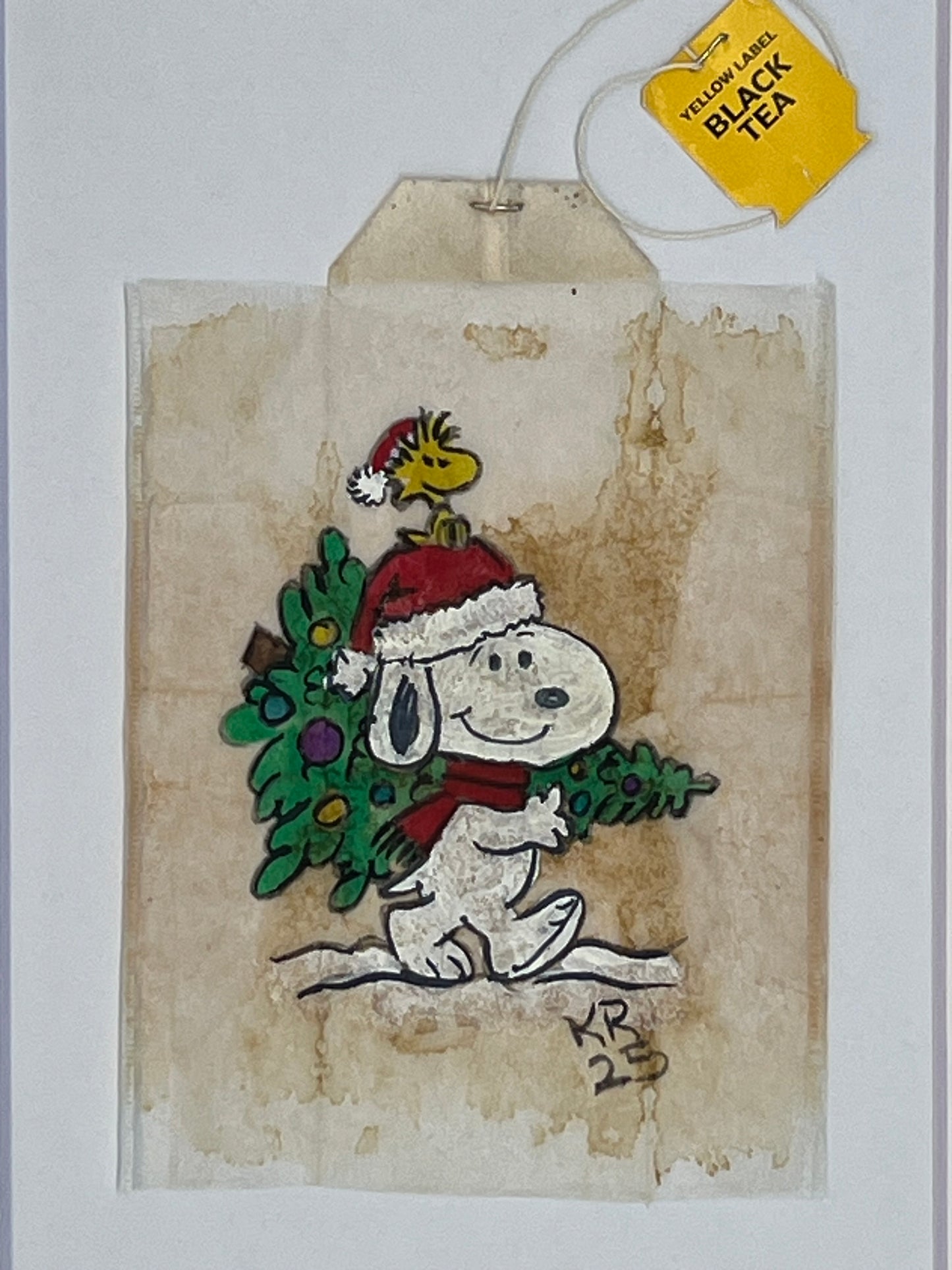 Snoopy and woodstock with tree