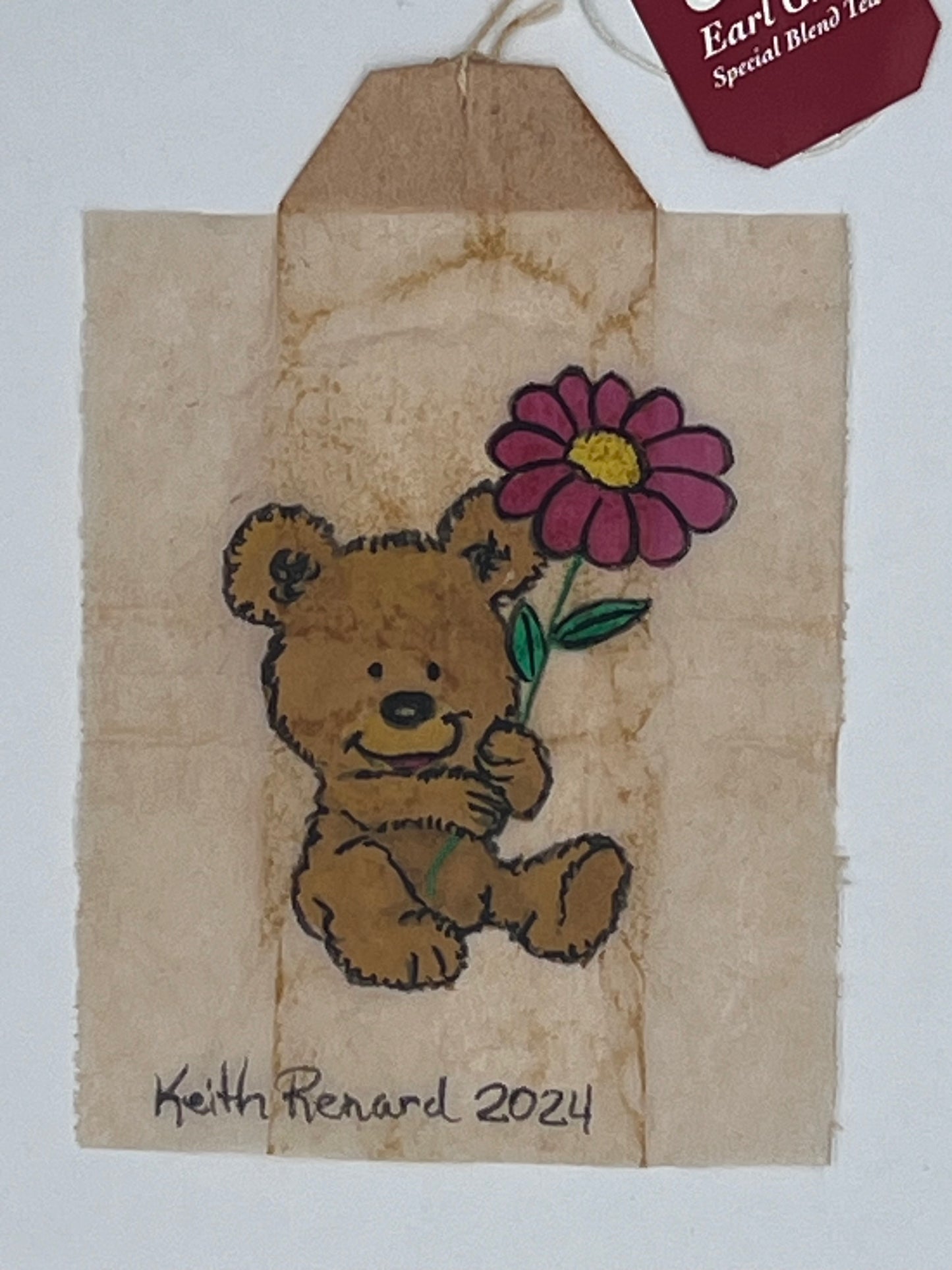 Bear with flower