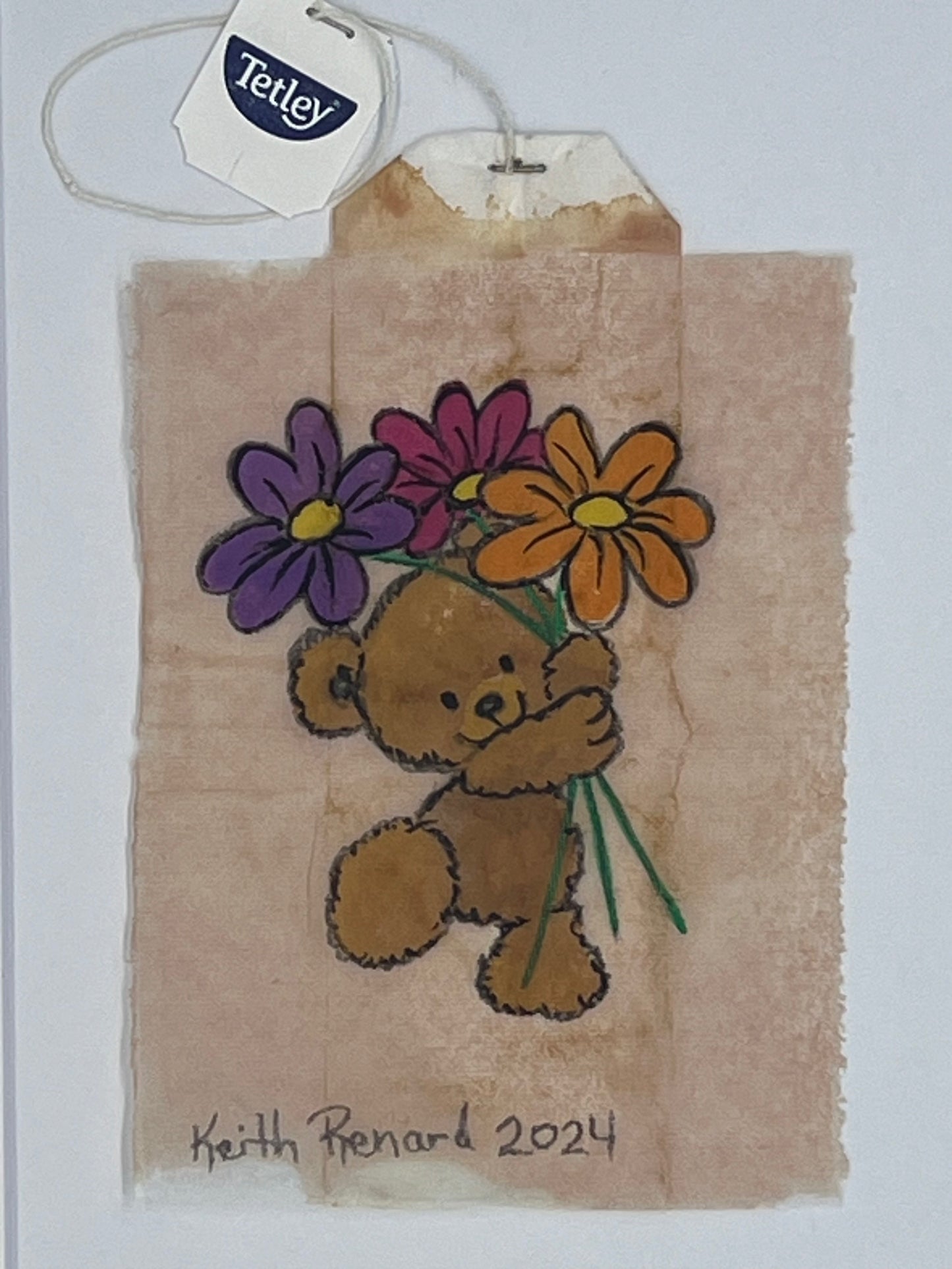 Bear with flowers