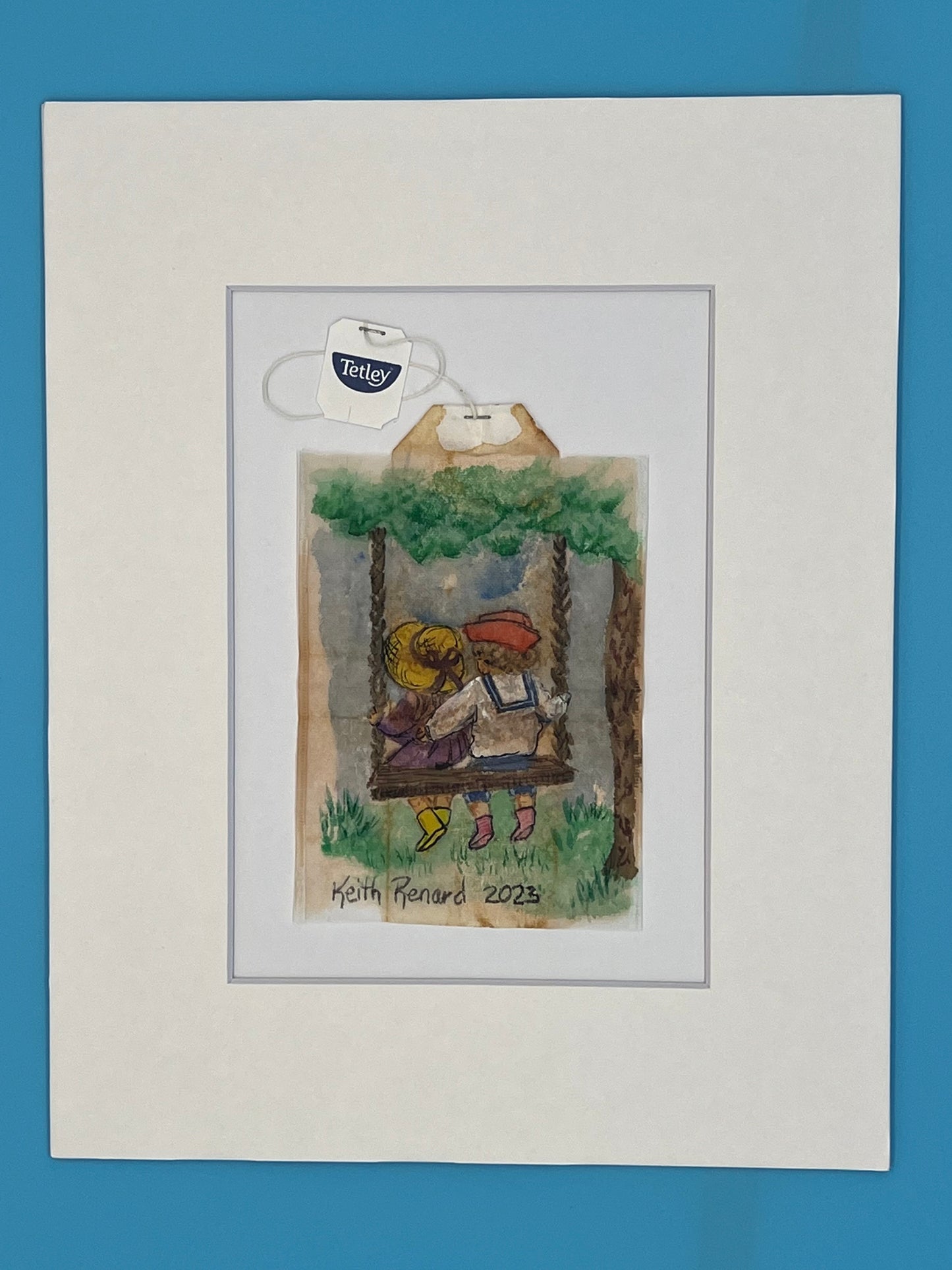 boy and girl on swing