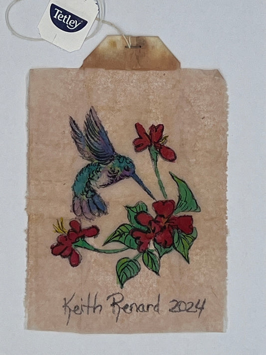 Hummingbird with red flowers