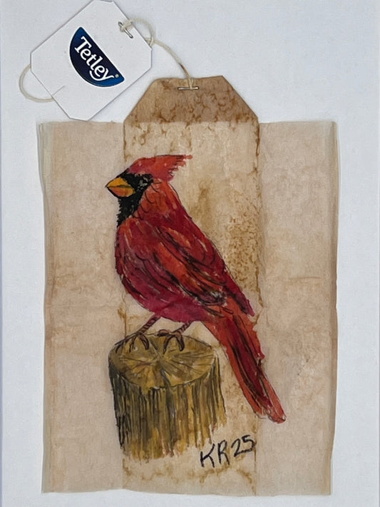 Cardinal on a stump