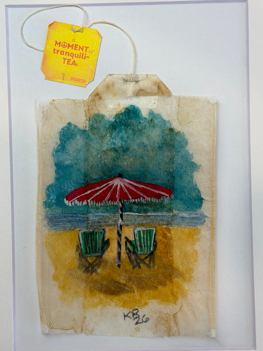 Beach chairs and umbrella red and green