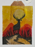 Buck with yellow sky